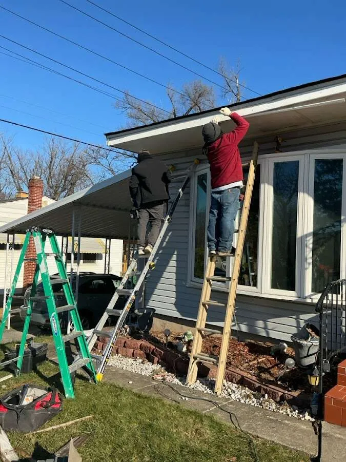 Restoration crew performing exterior repair in Garfield